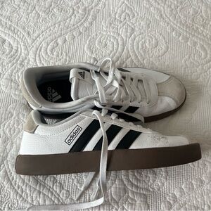 Adidas White Sneakers with Black Stripes and Brown Sole